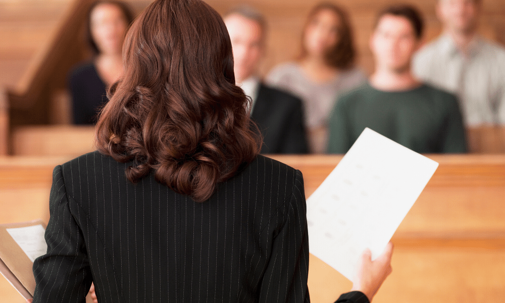 a prosecutor speaks to a jury