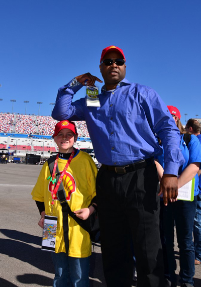 Todd Smith with a student at the raceway